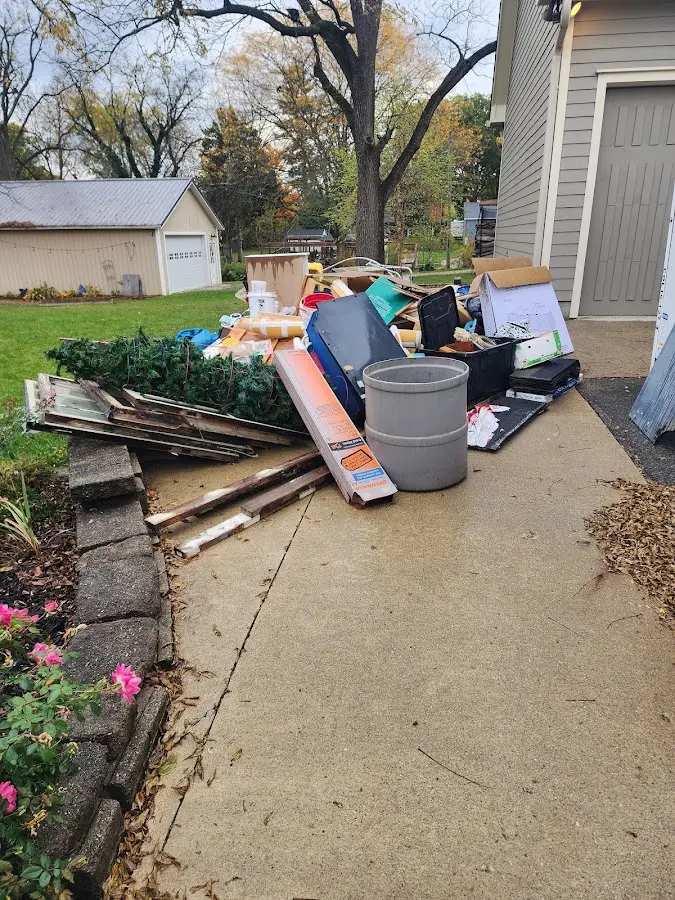 Dumpster being loaded with debris for 3 Yard Dumpster Rental in Pittsburgh